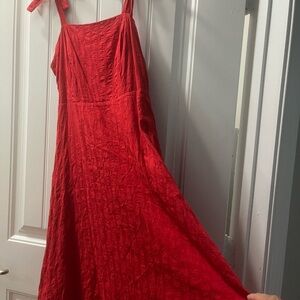 Sun dress, goes past knees. Hearts and stripes in material.